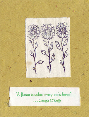 127 - 'A flower touches everyone's heart' on flocked yellow paper