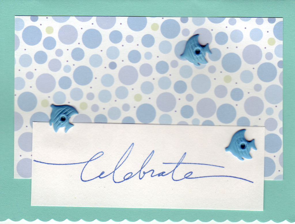 113 - 'Celebrate' w. fish brads on bubble dotted paper