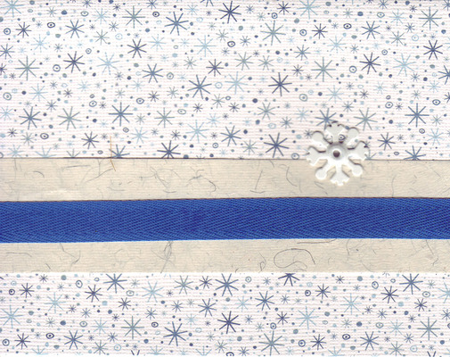 070 - A blue ribbon attached to a snowflake card by a metal snowflake brad