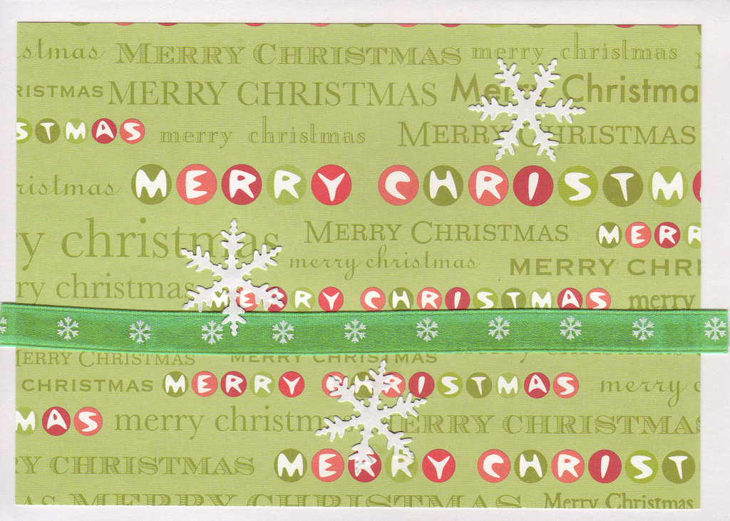 066 - Snowflakes over 'Merry Christmas' paper with a green snowflake ribbon