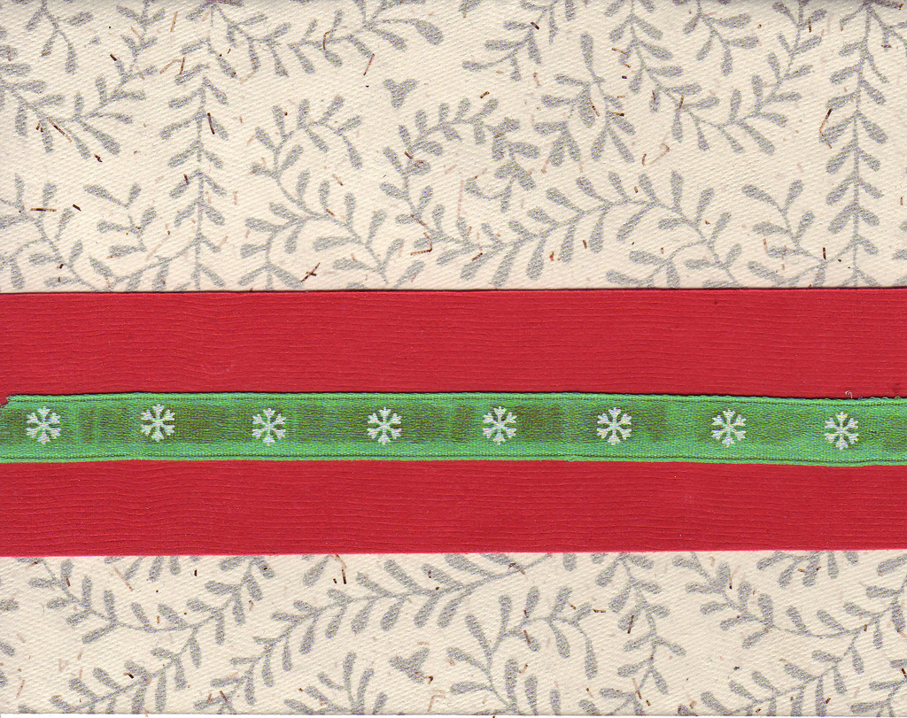 (SOLD) 080 - Green snowflake ribbon and red paper band on a richly textured card with fern print
