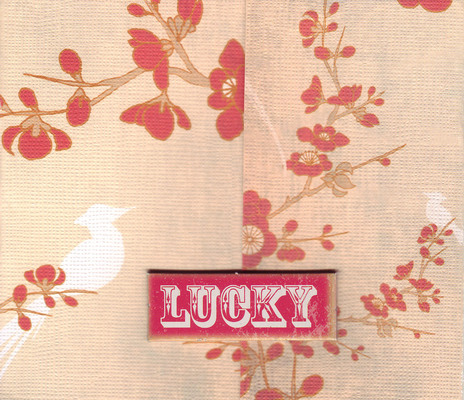 (SOLD)162 - 'Lucky' on cherry blossom print paper