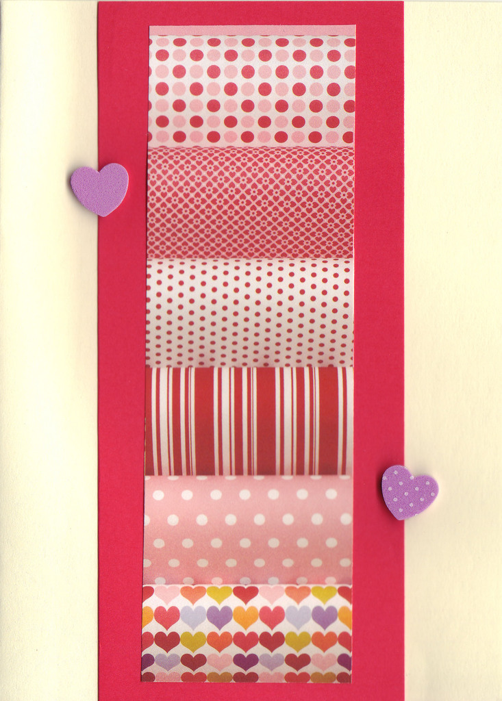 (SOLD)142 - Raised hearts on pink and red patterned paper