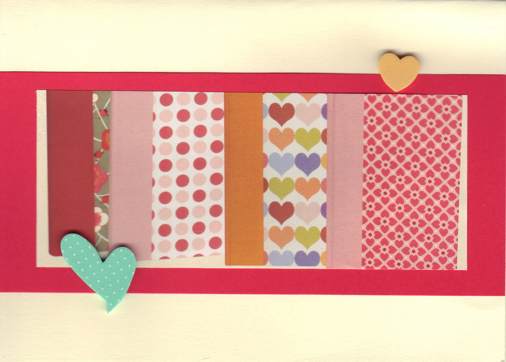 (SOLD)143 - Raised hearts on pink and red patterned paper