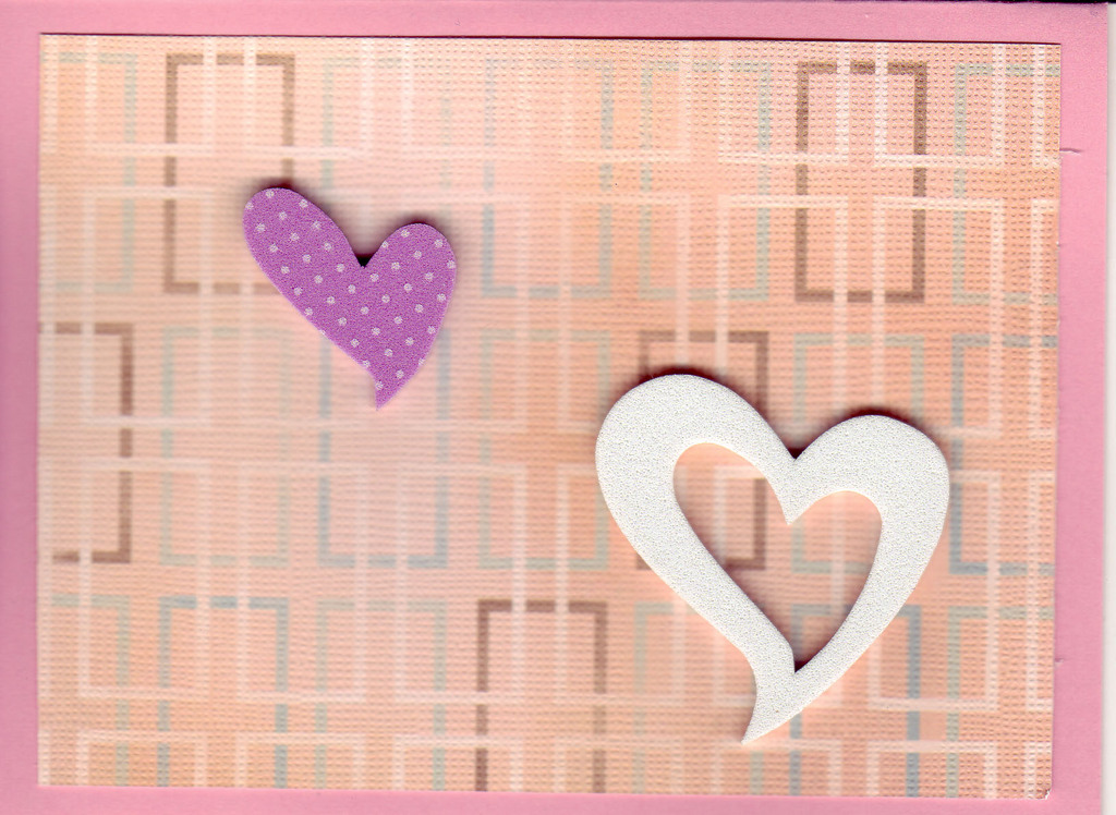 (SOLD)177 - 3-D hearts on a pink background