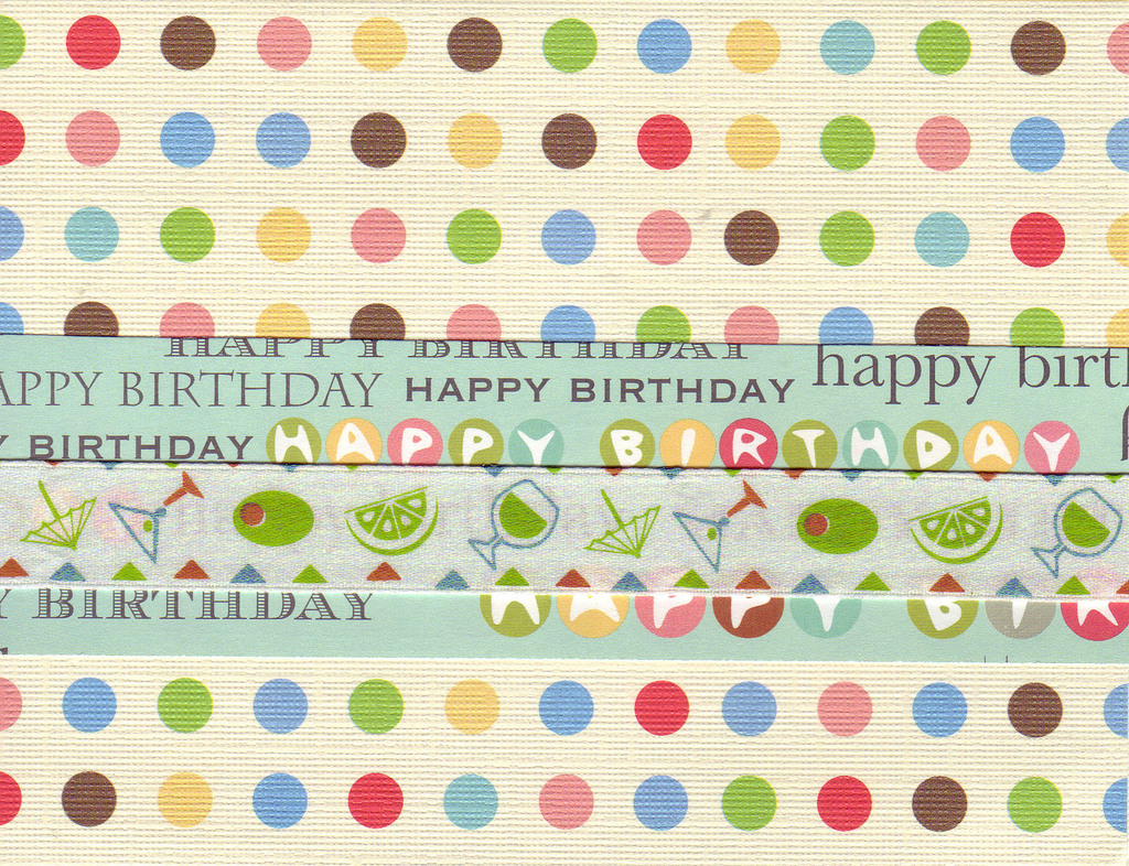 012 - 'Happy Birthday' on festive polka dotted paper with cocktail ribbon