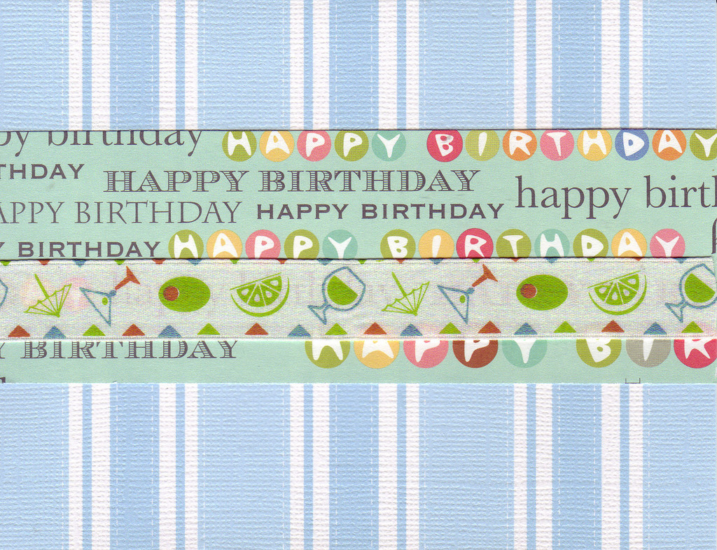 014 - 'Happy Birthday' on festive striped paper with ribbon