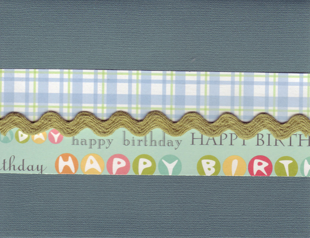 015 - 'Happy Birthday' on blue paper with ribbon