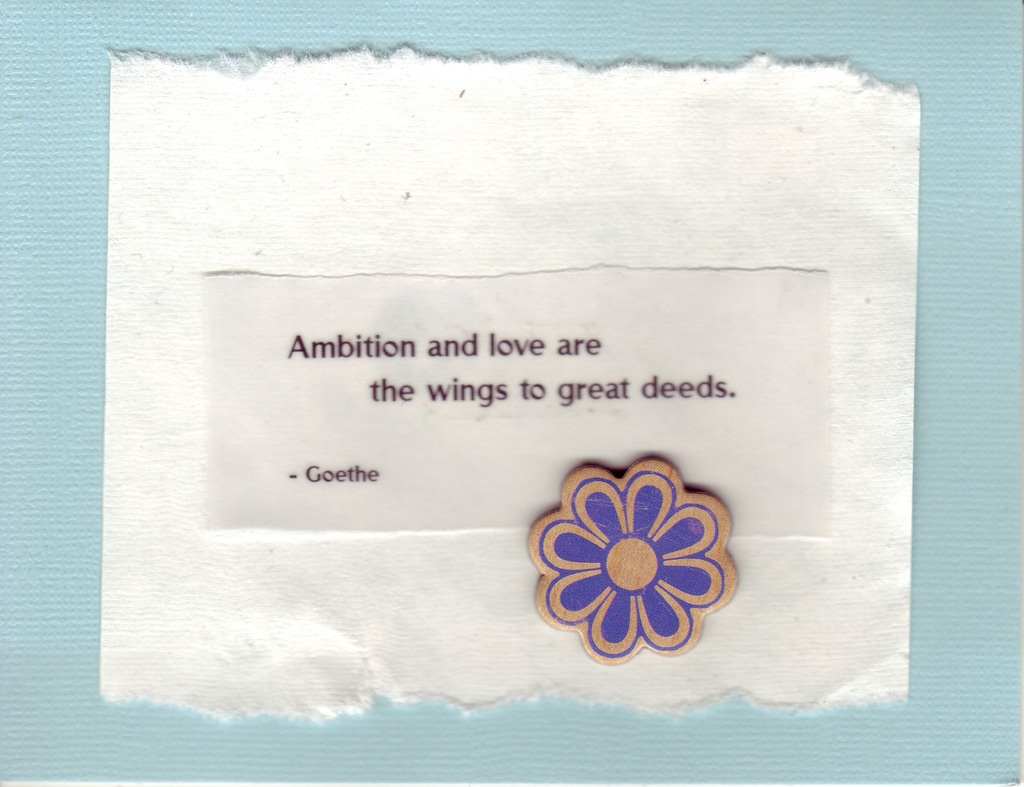 081 - 'Ambition and love are the wings to great deeds' on blue and white paper with blue heart