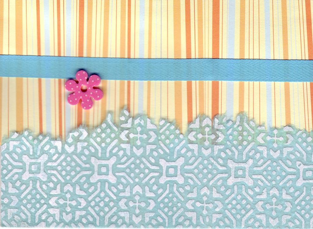 097 - Orange striped paper, with blue ribon and overlaidd elegnatly patterned paper with flower embellishment