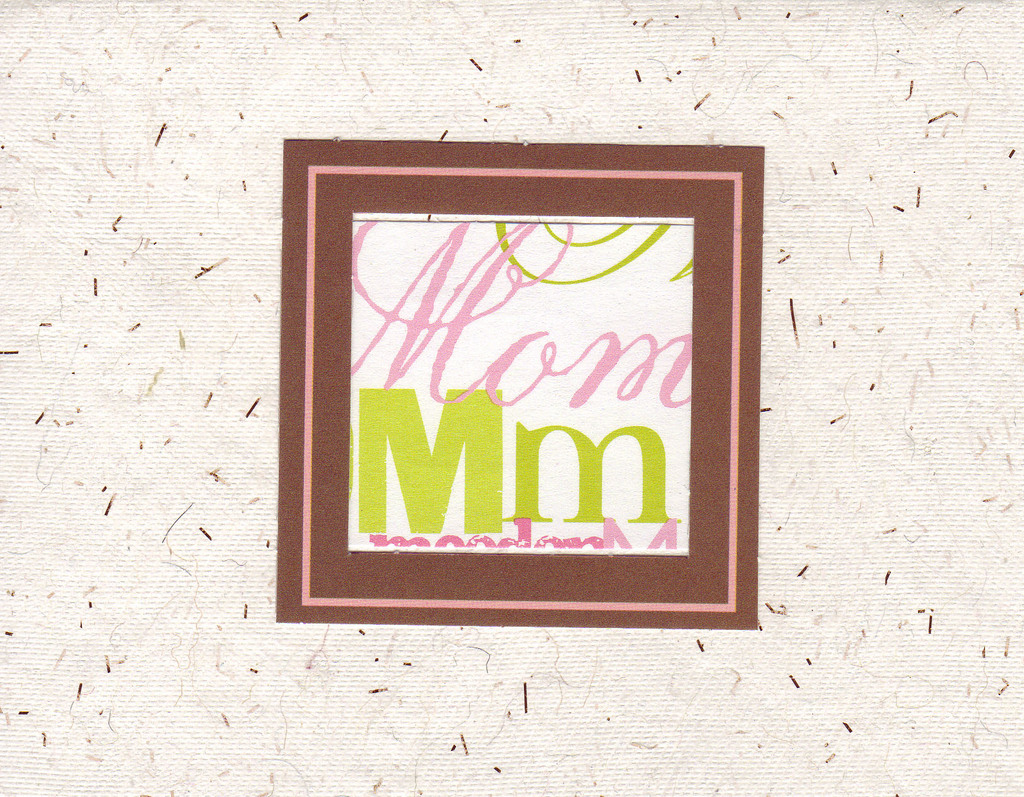 (SOLD) 020 - 'Mom' with brown and pink frame on paper with embedded speckles