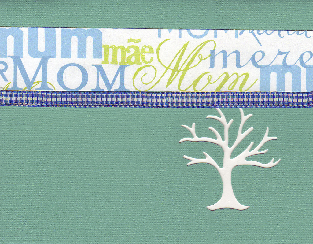 (SOLD) 022 - 'Mom, Mum, Moeder, Madre, Mere' with a blue checkered ribbon on a sea-foam green card with an elegant tree cut-out
