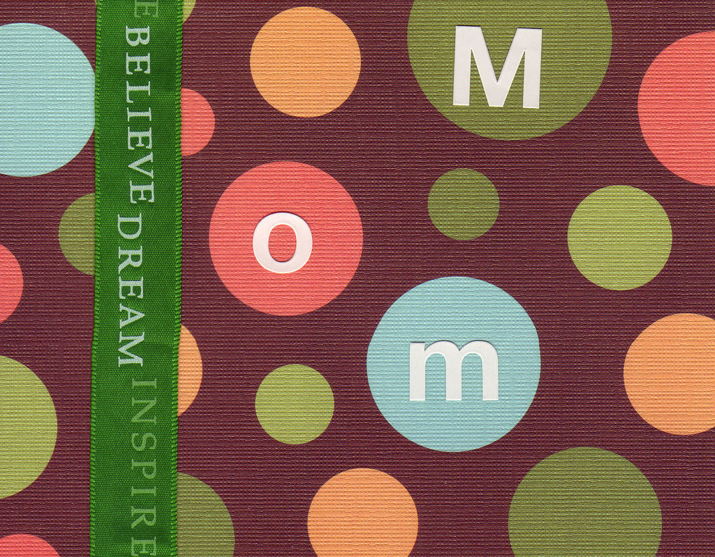 (SOLD) 025 - 'Mom' on a funkily dotted card with a 'Belive Dream Inspire' green ribbon