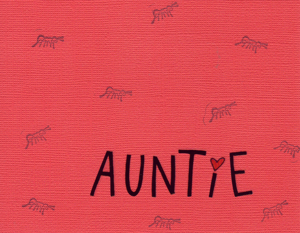 119 - 'Auntie' on red ant-stamped card