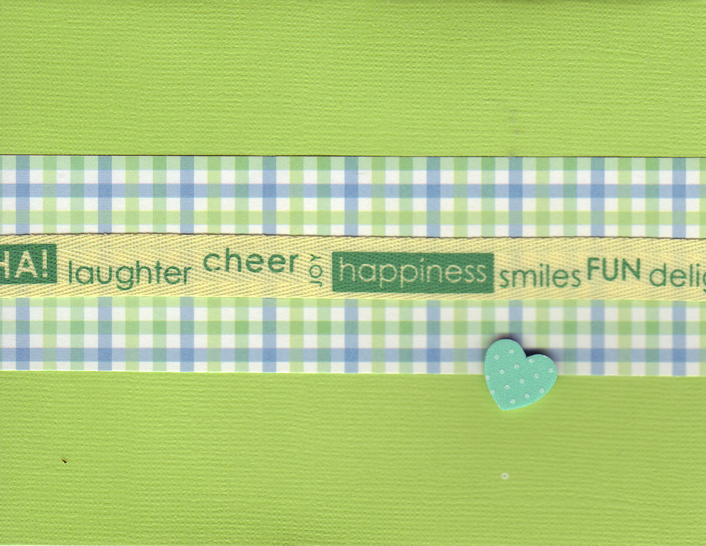 125 - 'Laughter, cheer, joy, happiness, smiles, fun, delight' on a ribbon, on green and blue plaid paper on a bright green card