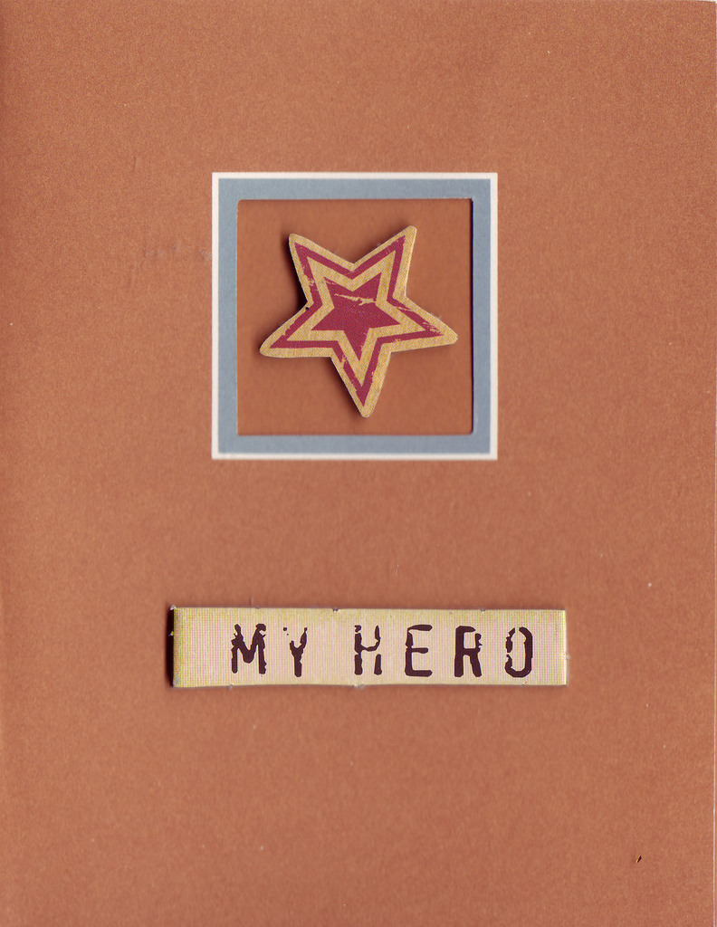 132 - 'My Hero' on a red card with a framed  star embellishment
