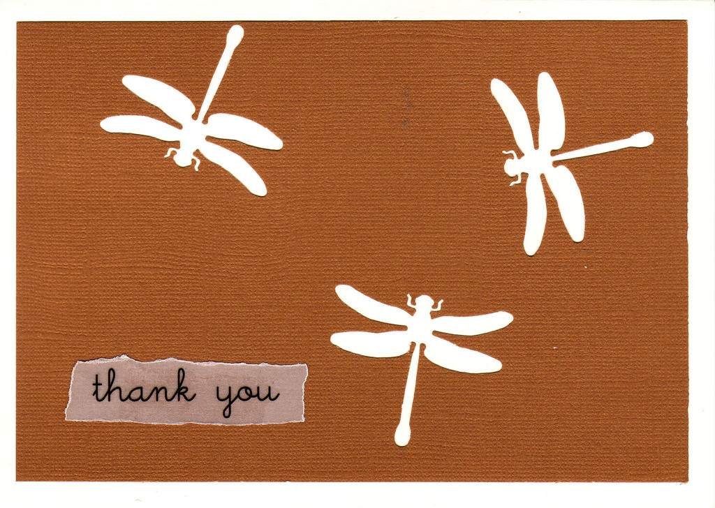 (SOLD) 147 - 'Thank you' atop deep red paper with dragonfly cutouts on a white card